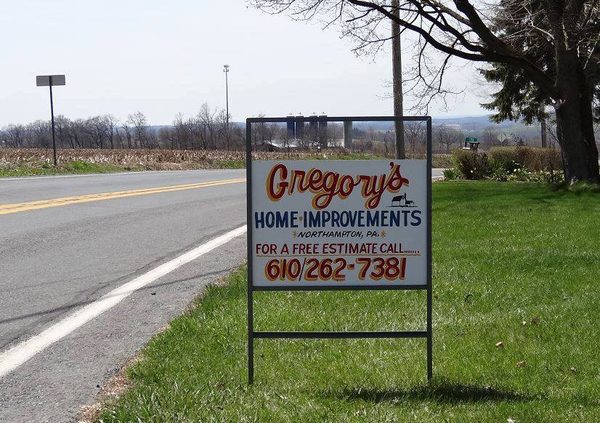 Gregory’s yard sign by a country road